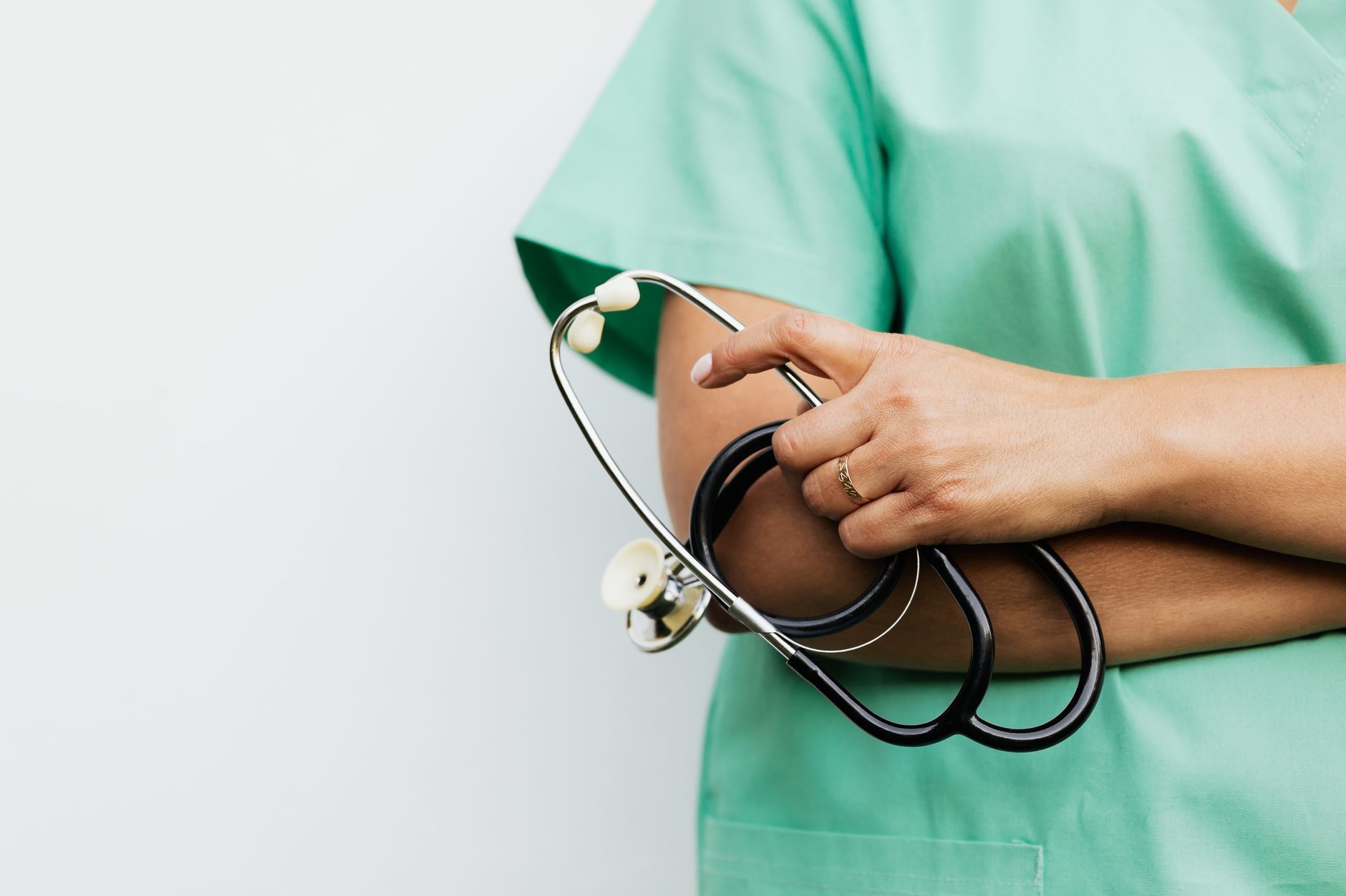 Close-up of a healthcare worker holding a stethoscope, showcasing medical professionalism. — Four Benefits of Medical Imaging