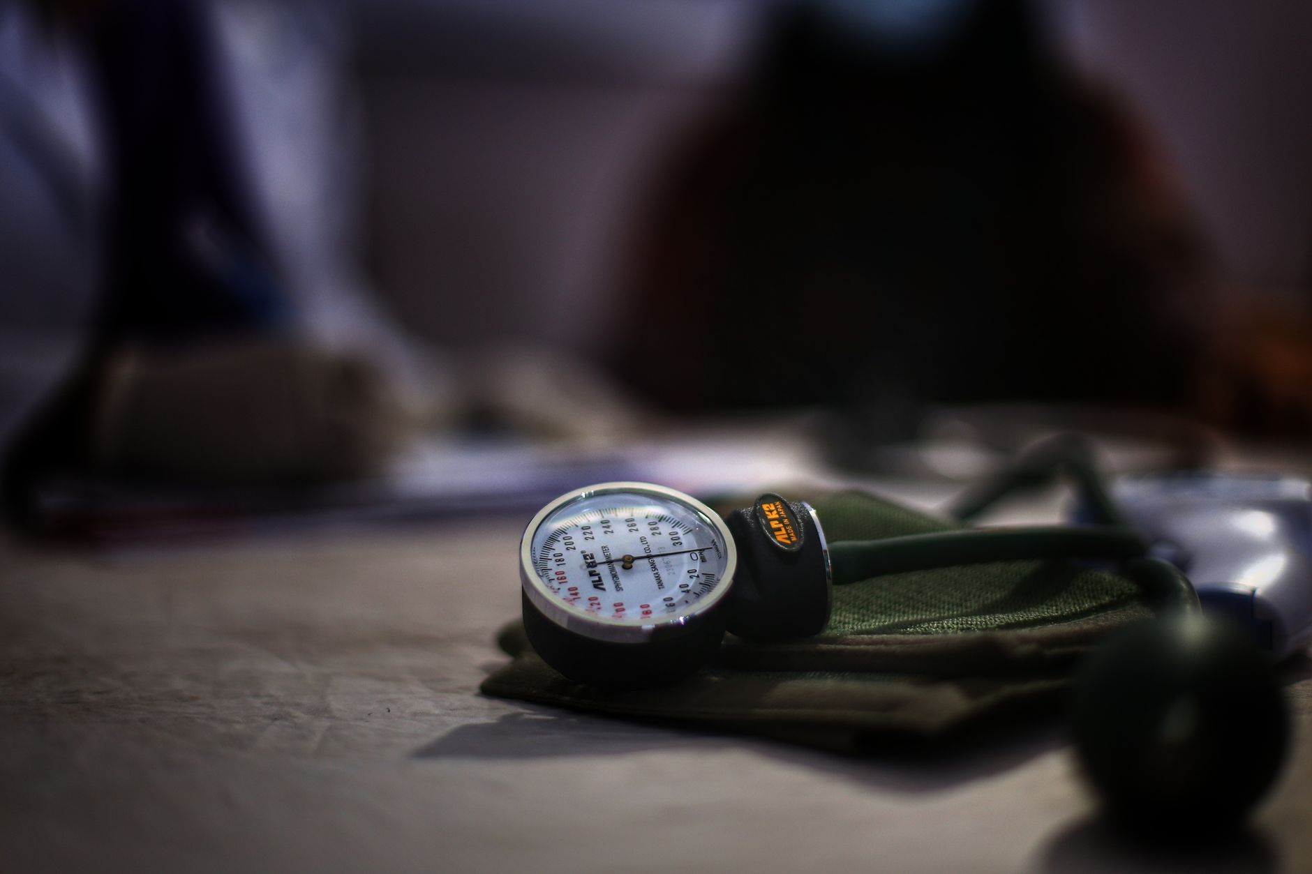 Detailed image of a medical sphygmomanometer on a table, indicating health check-up setting. — Get familiar with the extraord