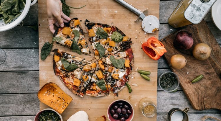 Mouthwatering vegan pizza topped with fresh vegetables, perfect for a healthy meal. — The significance of an entire Food Diet