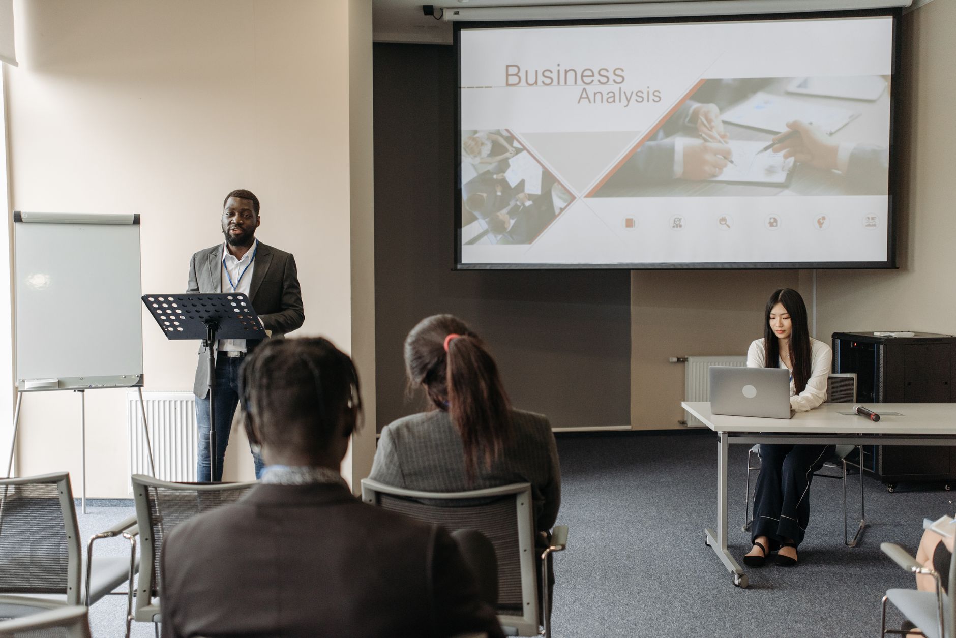Business seminar with a speaker and audience in a conference room. — Unlocking Connections: Private Messaging as a Catalyst f